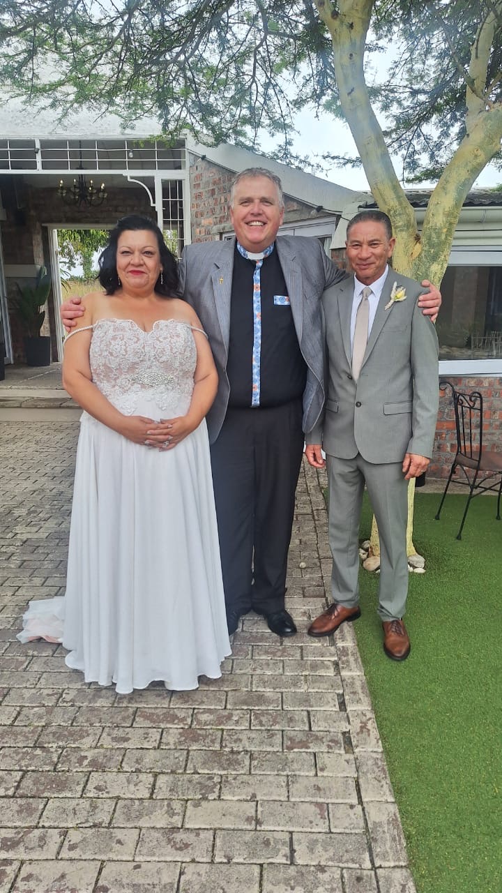 Wedding ceremony by Dr. Gerrit Rademeyer in Louisrus